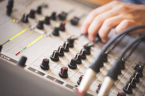 Professional mixer board in a studio sound.